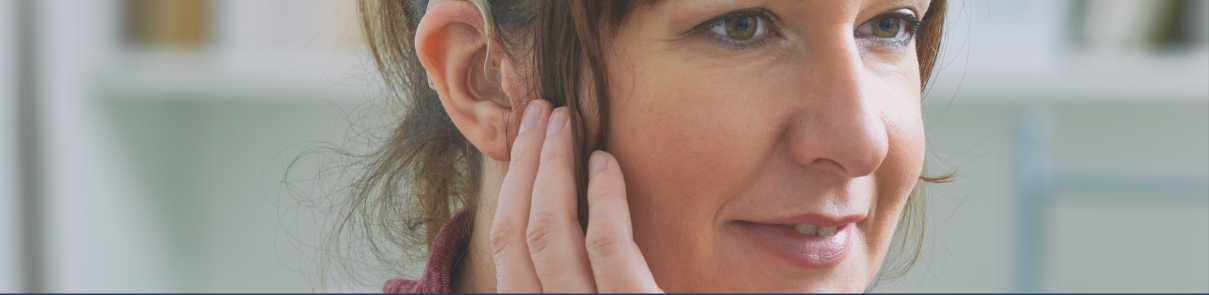 Como o uso correto de aparelhos auditivos pode minimizar o zumbido?